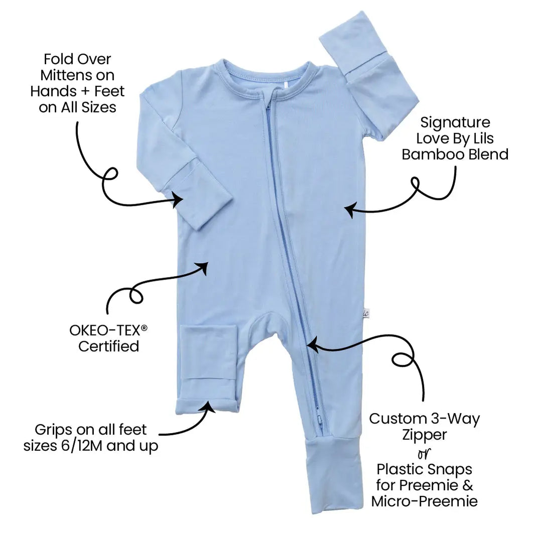 18 blue bamboo baby footie zip up in soft baby blue crafted from eco-friendly bamboo fabric gentle on baby skin perfect for sleeping, playing, or lounging breathable, lightweight, and durable a stylish practical baby sleeper essential for newborns and infants.