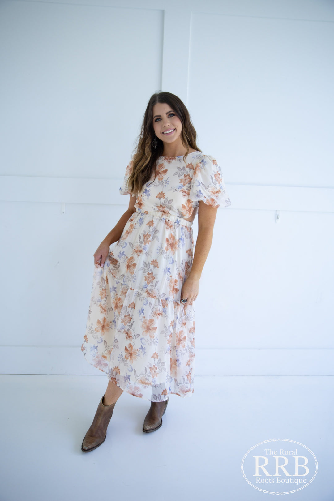 Elevate your wardrobe with The Little Prairie Dress, a beautiful ivory midi dress featuring romantic puff sleeves and a chic tie-back design. The open back adds a playful touch, making it perfect for garden parties or brunch with friends. Made from 100% polyester, this dress is available in Small (3-5), Medium (6-8), and Large (9-11).