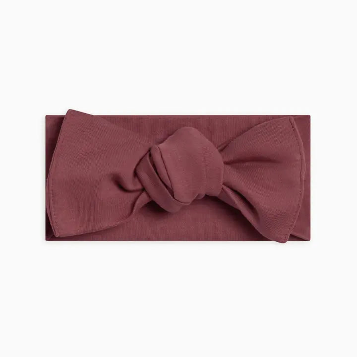 Berry Hattie knot bow wrap baby headband made from soft and stretchy fabric gentle on newborn and infant skin perfect for daily wear, photo sessions, or special occasions a stylish and comfortable accessory for baby girls and a thoughtful gift for new moms.