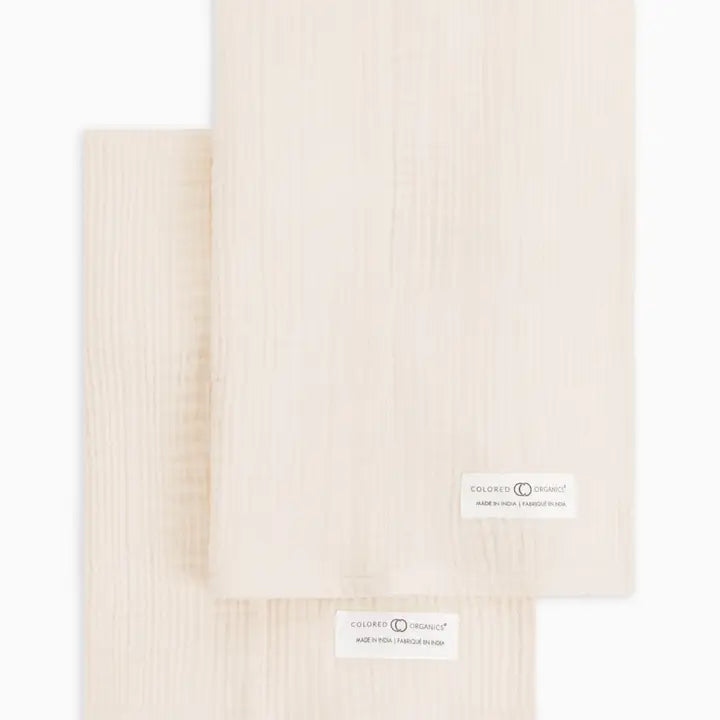 Classic muslin burp cloths 2 pack in natural color made from soft breathable organic cotton gentle on newborn and infant skin perfect for feeding drooling or teething durable easy to wash and an essential baby accessory and practical gift for new moms.