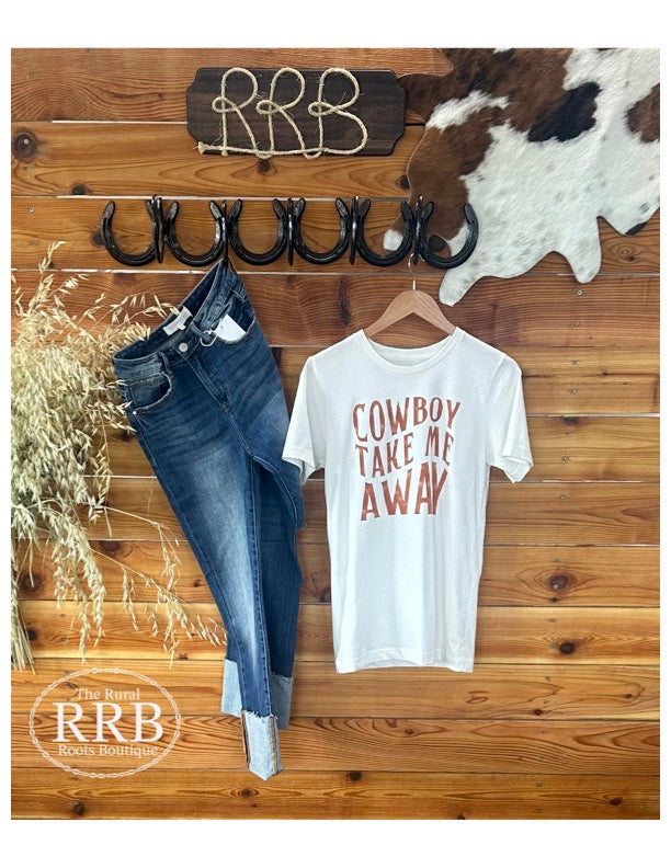 Embrace your inner cowboy with the Cowboy Take Me Away Graphic Tee in vintage white. Crafted from 100% cotton for ultimate comfort, this relaxed-fit shirt is ideal for any occasion. Style it with the Laramie High Rise Cuffed Straight Jeans for a trendy, Western-inspired outfit.