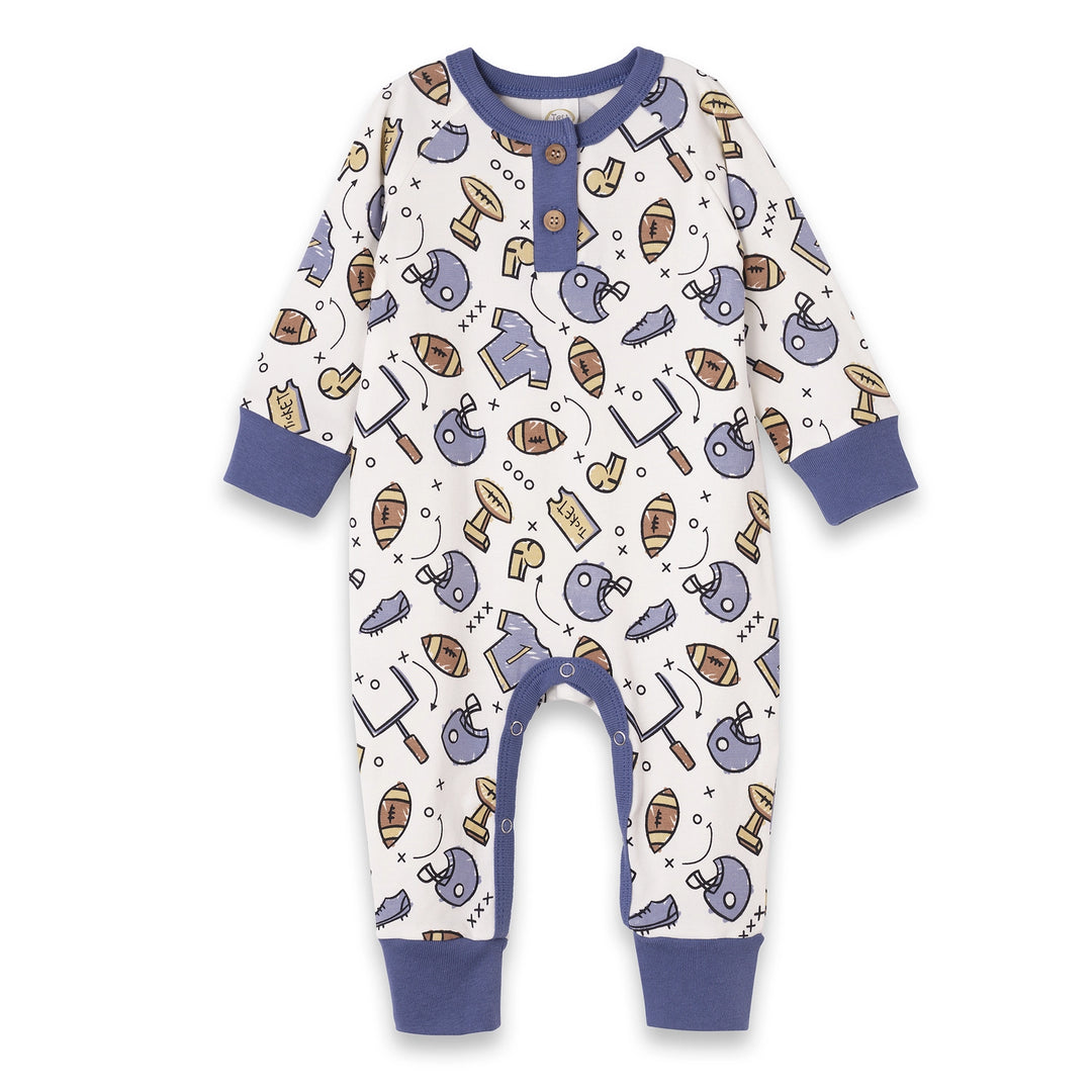 Score style points with The Football Romper, a playful Henley designed for your little all-star. Crafted from a luxurious bamboo-cotton-spandex blend, this romper is ultra-soft, breathable, and naturally hypoallergenic—perfect for sensitive skin. The fabric’s absorbent and eco-friendly qualities make it a smart choice for everyday wear, while the fun football graphics and bold contrast trim add a touch of sporty flair. Thoughtfully designed with front buttons and bottom snaps, diaper changes are quick and s