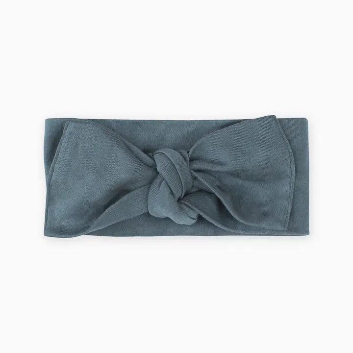 Harbor Hattie knot bow wrap baby headband in grey blue made from soft stretchy fabric gentle on newborn and infant skin perfect for everyday wear photo shoots or special occasions a stylish comfortable accessory for baby girls and a thoughtful gift for new moms.