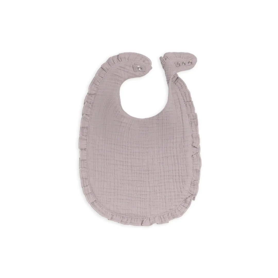 Lilla organic muslin baby bib with ruffle details made from soft lightweight cotton gentle on baby skin ideal for feeding, drooling, or teething durable, easy to clean, and a must-have practical and stylish baby essential for newborns and infants.