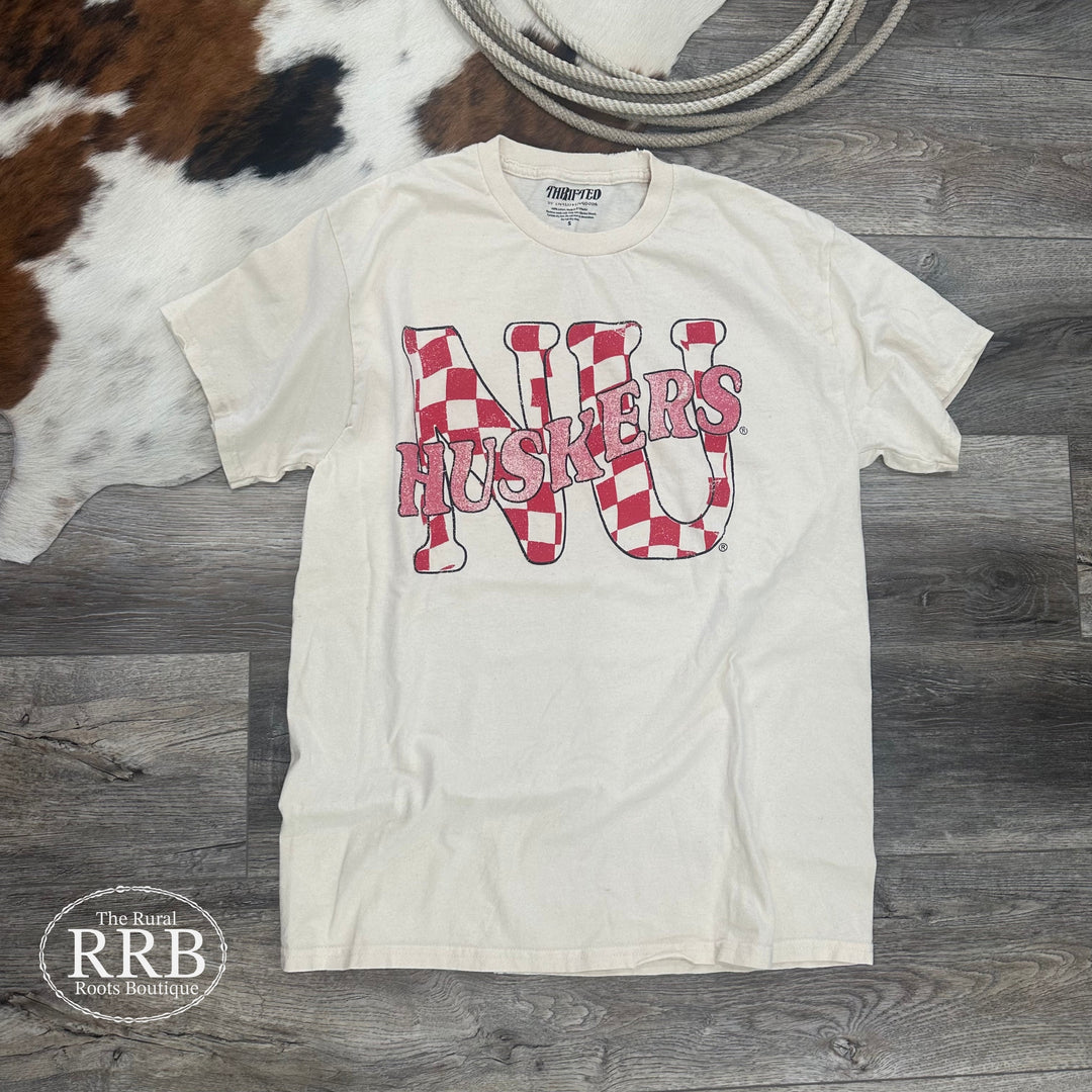 Elevate your casual style with the Checkered NU T-shirt in Off White. Made from 100% cotton, this relaxed-fit t-shirt offers both comfort and style. Perfect for layering or wearing alone, it’s recommended to size down if you are in between sizes. Available in small, medium, large, and x-large.