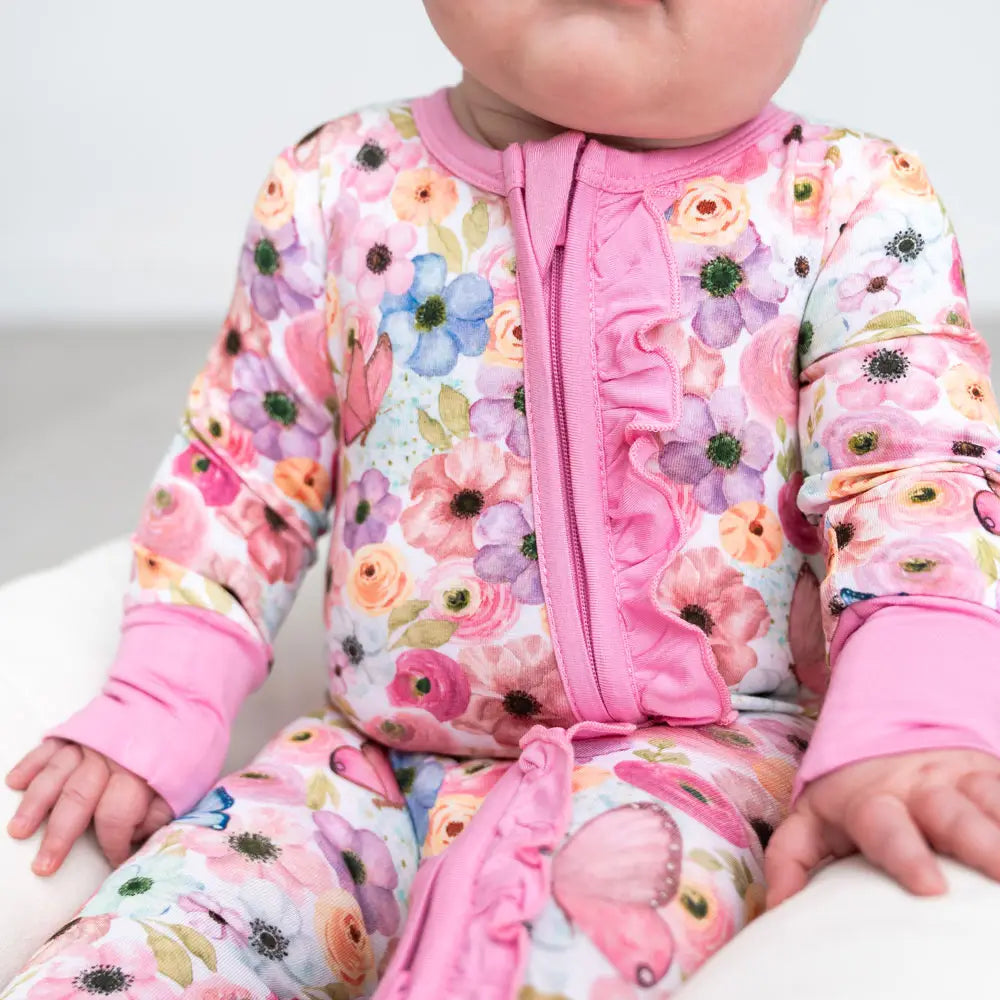 Lillians Garden pink floral bamboo footie with zip up closure crafted from soft stretchy bamboo fabric gentle on baby skin ideal for naps, bedtime, or playtime lightweight, breathable, durable, and a must-have practical and stylish baby clothing essential for girls.