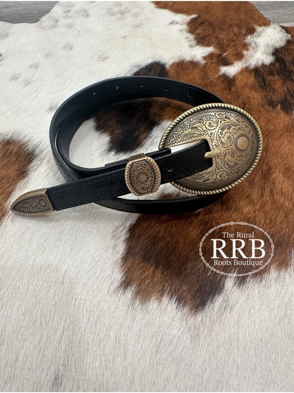 Elegant oval embossed vintage belt buckle in black, paired with a 42-inch long and 0.6-inch wide leather strap. Perfect for adding a timeless, Western-inspired accent to any outfit.
