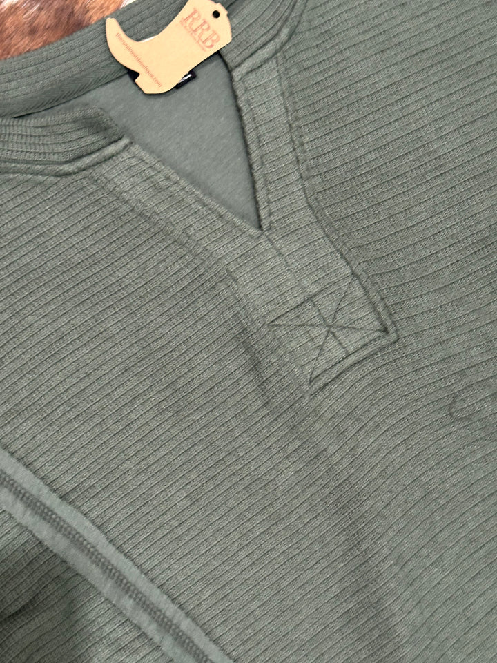 Upgrade your wardrobe with The Destin Sweater Knit Top in rich hunter green. This chic top features a split neck, long sleeves, and artistic patchwork detailing. The raw edge and exposed seam design provide a contemporary flair, while its relaxed fit offers ultimate comfort. Crafted from 55% polyester, 42% rayon, and 3% spandex, it’s ideal for casual outings.