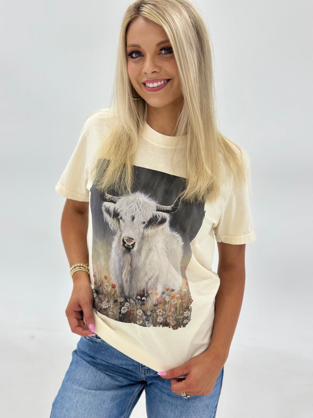 The Angel Western Graphic Tee in Ivory features a stunning watercolor artwork design on soft, breathable 100% cotton with a unisex fit. Available in Small (3-5), Medium (6-8), Large (9-11), and X-Large (12-14).