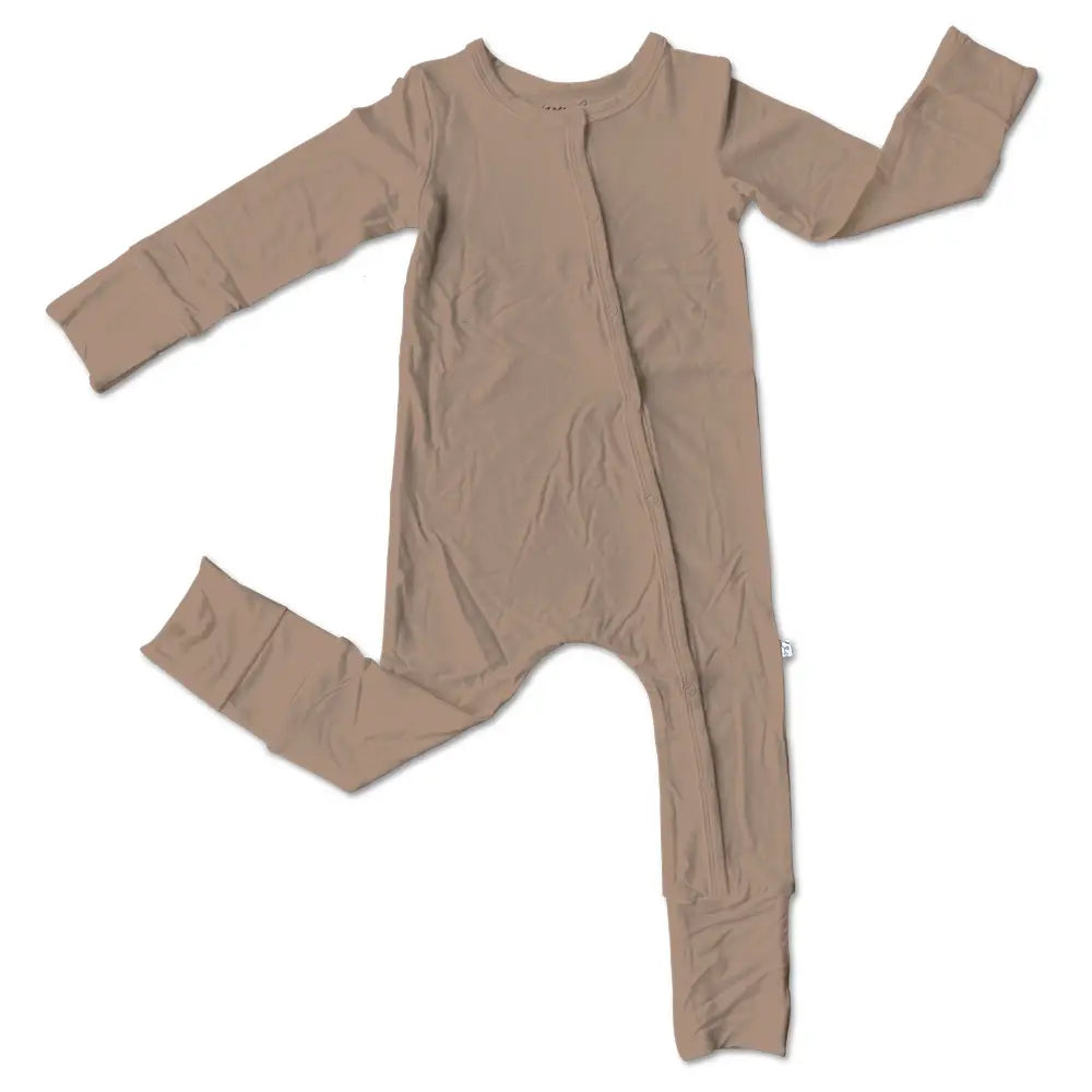 Meet The Colette Bamboo Footie, the ultimate everyday essential for your little one. Crafted from buttery-soft, certified bamboo, this footie feels silky smooth against delicate skin while remaining lightweight, stretchy, and supremely cozy. Designed with convertible fold-over feet and mittens, it adapts effortlessly to both playtime and bedtime, keeping tiny toes warm and little hands protected from scratches. Bamboo’s natural properties make this piece hypoallergenic, temperature-regulating, and breathabl