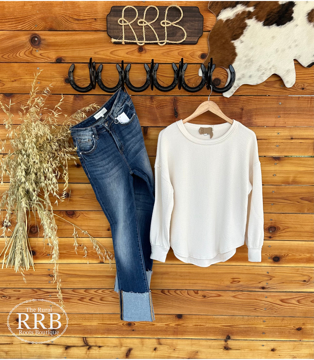 Shop The Crofton Sweater Knit Top in off white for a perfect blend of comfort and style. This relaxed-fit top features a round neckline and long sleeves, made from a soft blend of 87% polyester, 9% rayon, and 4% spandex. Ideal for layering or wearing alone, it's a must-have for your wardrobe.