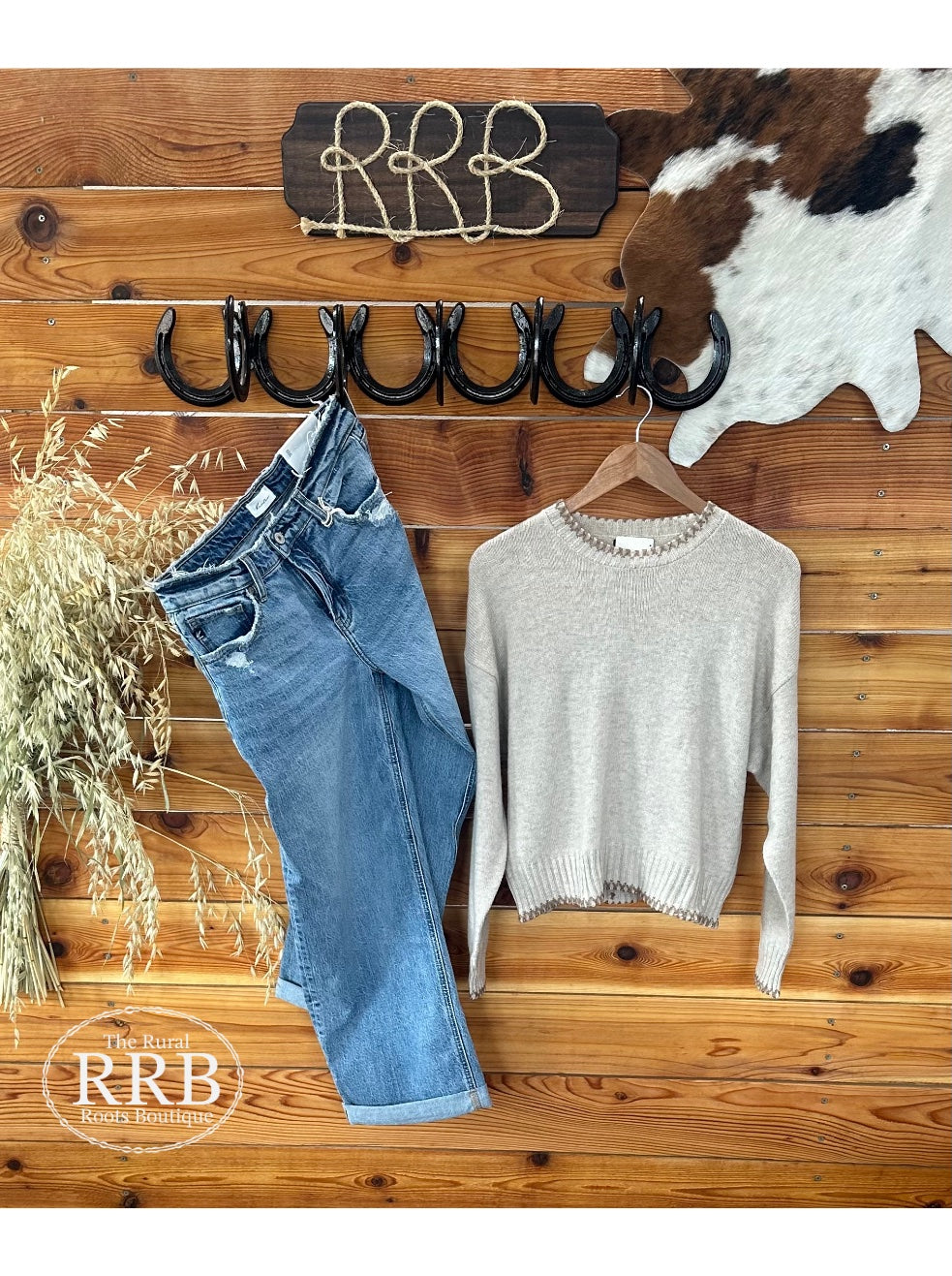 Introducing The Danbury Oatmeal/Brown Knit Top, featuring beautiful stitch detailing and a rounded neckline. Made from a soft woven knit fabric blend of 60% acrylic, 25% polyester, and 15% wool, this top offers comfort and style. Perfectly paired with the Decatur High Rise Wide Leg Jean for a chic look, available in small (2-4), medium (6-8), and large (8-10). Elevate your casual wardrobe with this cozy staple!