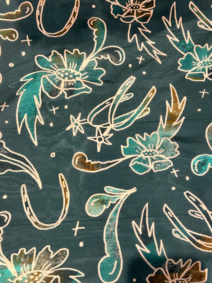 The Floral Wild Rag features a hand-drawn design on 100% Mulberry silk. Wear it as a bandana, headband, ponytail, or neck scarf. Size 35" x 35".