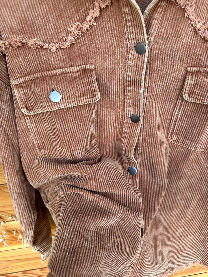 Stay stylish and comfortable with The Hester Camel Shacket. This mineral washed garment features a classic collar, front button closure, and practical front chest pockets, perfect for everyday wear. The long sleeves with button cuffs offer a relaxed and loose fit that pairs effortlessly with various outfits. Made from a soft fabric blend of 95% polyester and 5% spandex, it’s available in Small (3-5), Medium (6-8), and Large (9-11). If you're in between sizes, we recommend sizing down for a better fit.
