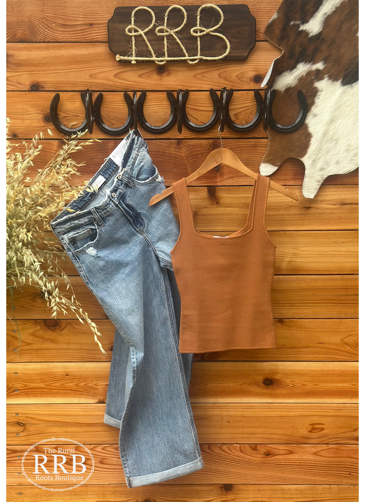 Elegant and fitted, The Melinda seamless sweater tank in carmel, featuring a square neckline and wide straps for a flattering silhouette. This solid, versatile top is crafted from a blend of 30% viscose and 30% polyester, available in Small (2-4), Medium (6-8), and Large (8-10). Perfect for layering or wearing alone, similar to stylish tanks from Anthropologie and Madewell.