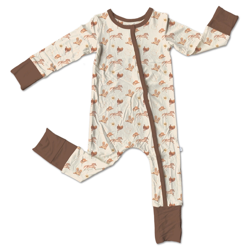 The Paislee Bamboo Footie is designed to be a go-to staple in your baby’s wardrobe—combining luxurious softness with everyday practicality. Made from certified bamboo, this footie feels silky smooth and buttery-soft against delicate skin while remaining lightweight, stretchy, and breathable. Convertible fold-over feet and mittens adapt to your baby’s needs, keeping tiny toes warm and hands protected from scratches. Naturally hypoallergenic, temperature-regulating, and gentle on sensitive skin, bamboo offers