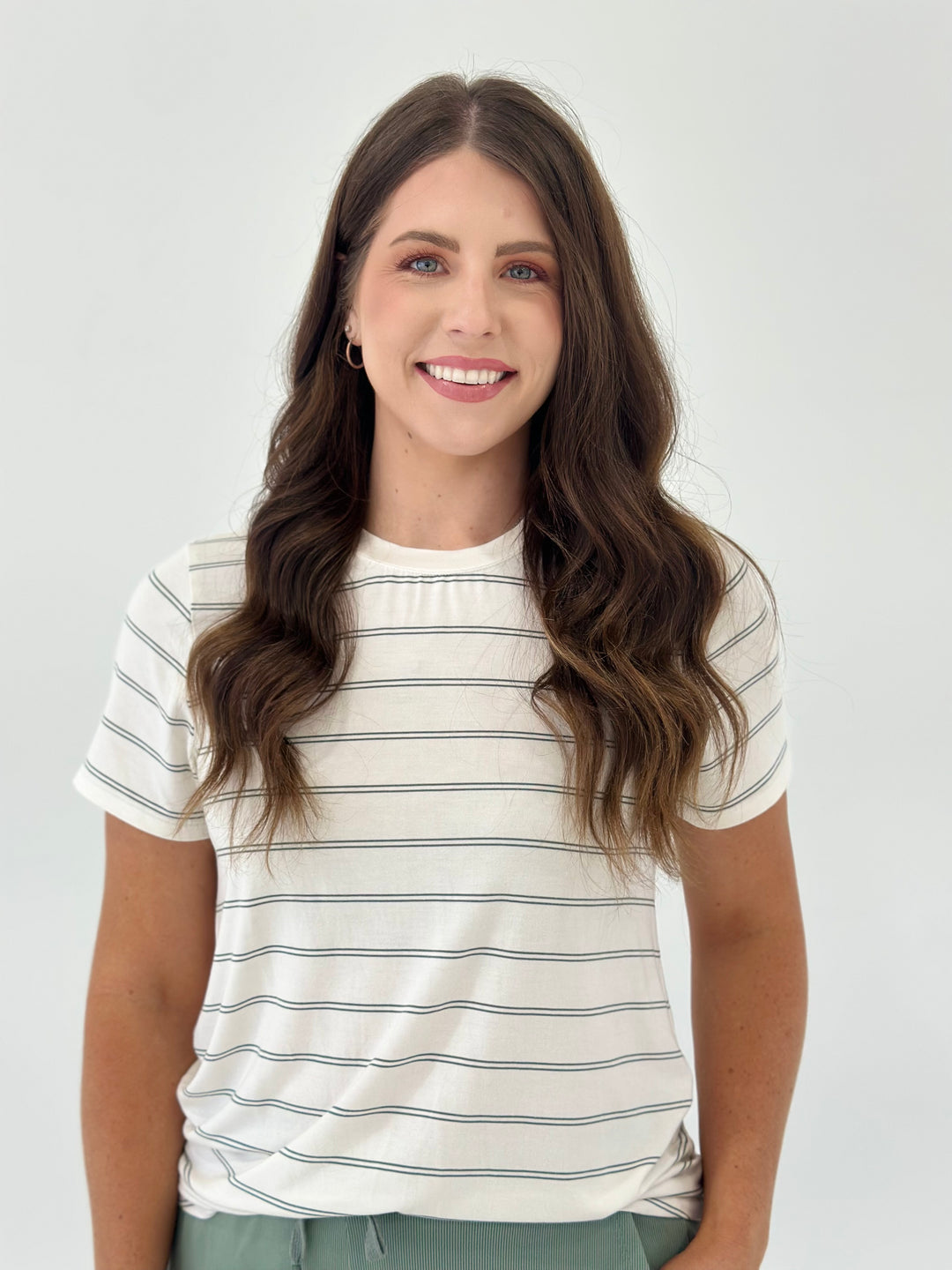 The Peaster Tee in Desert Green Stripe is made with a super soft 95% Tencel Modal and 5% Spandex blend for ultimate comfort and stretch. Available in Small (3-5), Medium (6-8), and Large (9-11).