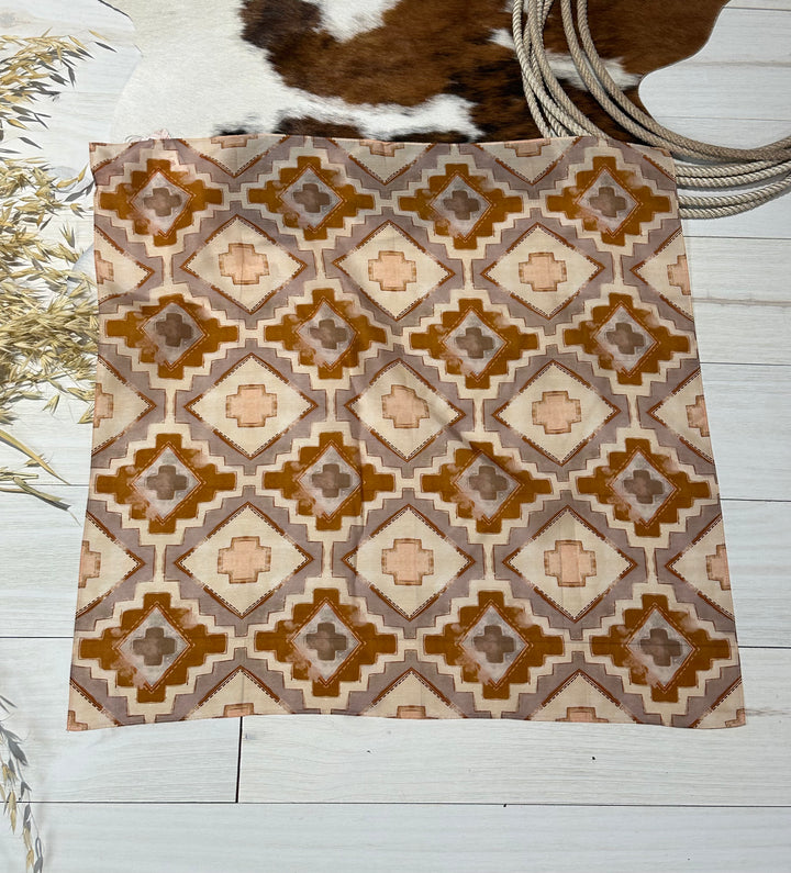 The Rustic Wild Rag, a western wild rag made from 100% Mulberry silk, hand-drawn and designed. Versatile 35" x 35" accessory for bandanas, headbands, ponytails, and neck scarves.