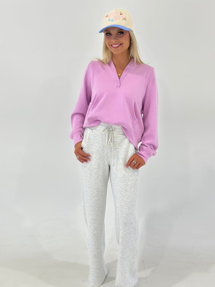 The Shane Scuba Straight Pant in Light Heather Grey features silky smooth, lightweight, and cooling Modal Poly Span fabric with a relaxed fit, elastic waistband with drawstring, and side pockets. Made from 48% Modal, 45% Polyester, and 7% Spandex. Available in Small (3-5), Medium (6-8), and Large (9-11).