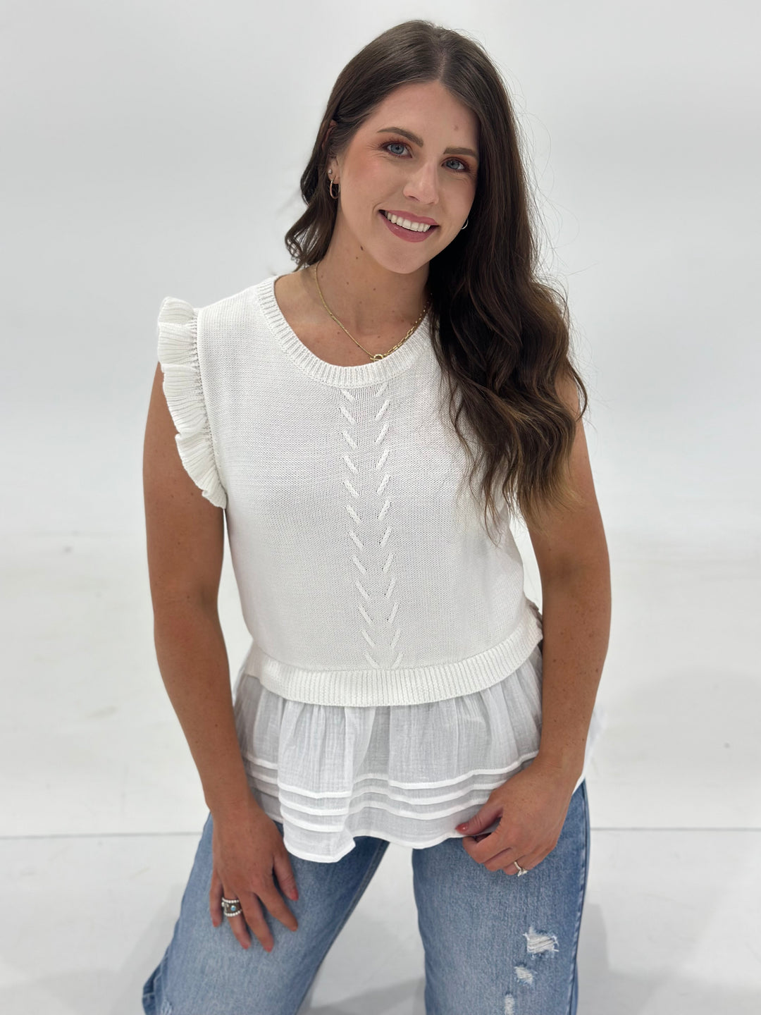 The Shania White Top is the ultimate wardrobe essential, blending timeless style with modern elegance. This fitted long-sleeve blouse features a sleek, body-hugging silhouette that flatters every shape while offering all-day comfort. Made from ultra-soft, breathable fabric with just the right amount of stretch, The Shania is perfect for layering under blazers, pairing with high-waisted jeans, or styling with a statement skirt. Whether you're heading to brunch, a business meeting, or a casual night out, this