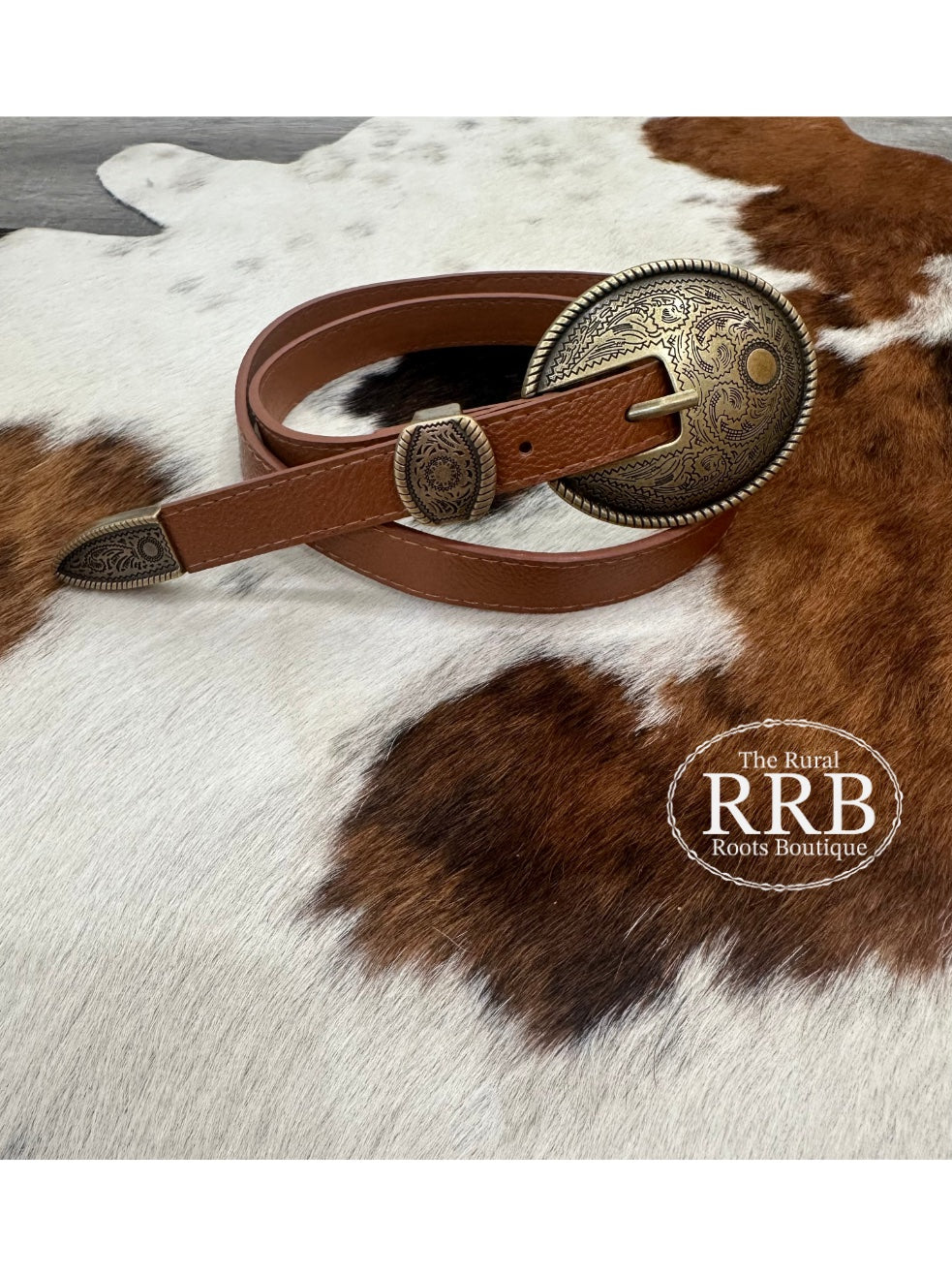 Classic vintage oval embossed belt buckle in sleek black, designed for a stylish finish on any outfit. The belt measures 42 inches long and 0.6 inches wide, making it a versatile accessory for both casual and dressy occasions.