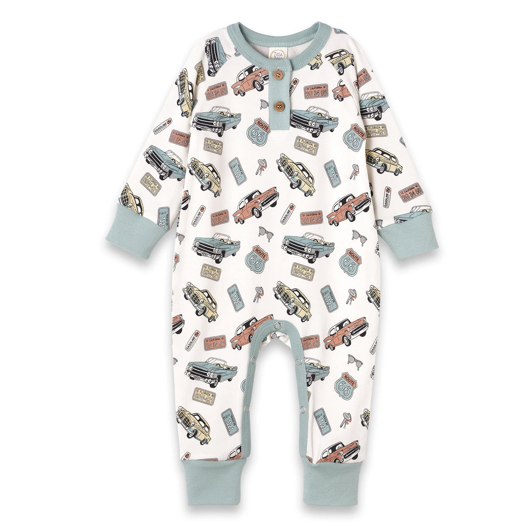 Get your little one ready for adventure with the Vintage Car Romper, a Henley-style piece that combines retro charm with everyday comfort. Crafted from an ultra-soft bamboo-cotton-spandex blend, this romper is naturally breathable, hypoallergenic, and eco-friendly—perfect for sensitive skin. The classic vintage car print brings playful, nostalgic style to any outfit, while wood-look front buttons and bottom snaps make dressing and diaper changes effortless. Lightweight, stretchy, and cozy, this romper keeps