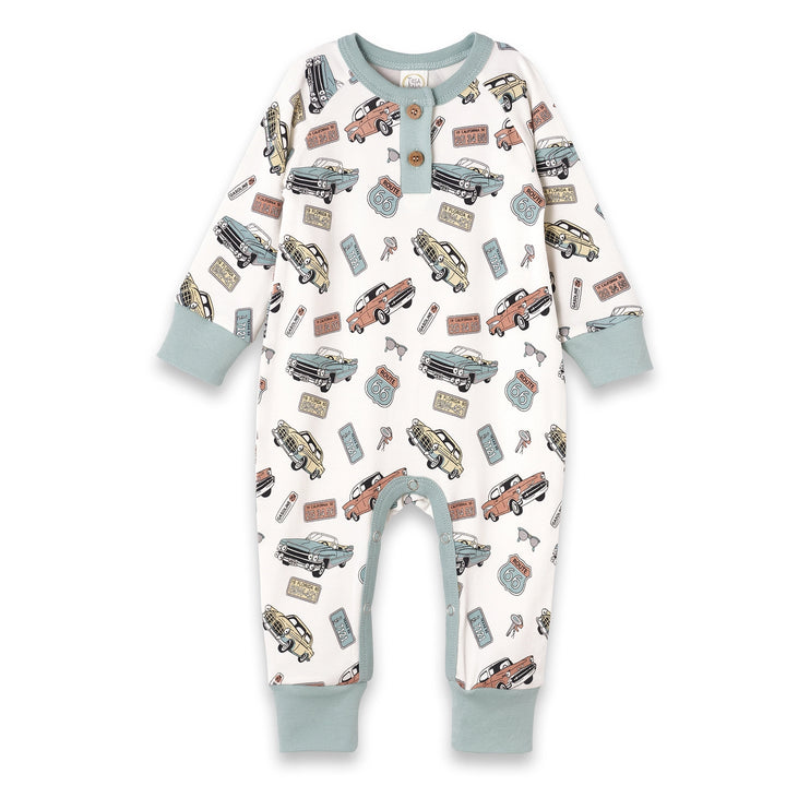 Get your little one ready for adventure with the Vintage Car Romper, a Henley-style piece that combines retro charm with everyday comfort. Crafted from an ultra-soft bamboo-cotton-spandex blend, this romper is naturally breathable, hypoallergenic, and eco-friendly—perfect for sensitive skin. The classic vintage car print brings playful, nostalgic style to any outfit, while wood-look front buttons and bottom snaps make dressing and diaper changes effortless. Lightweight, stretchy, and cozy, this romper keeps